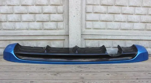 Rear bumper trim bar molding
