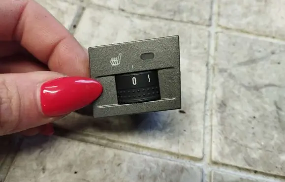 Seat heating switch
