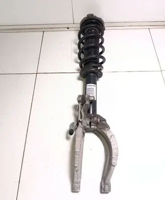 Front shock absorber with coil spring