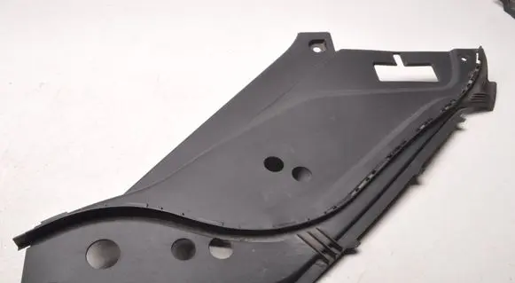 Engine bonnet/hood lock trim molding