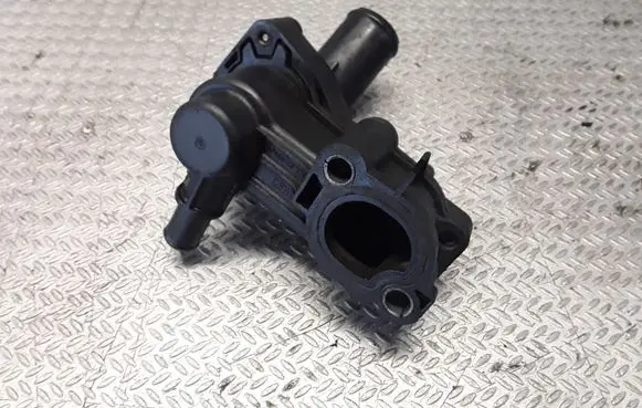 Thermostat/thermostat housing