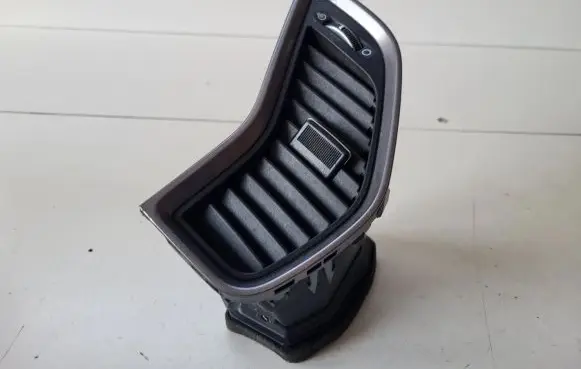 Hyundai Santa Fe Dash center air vent grill 974102W000