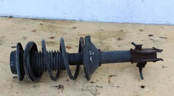 Subaru Forester SF Front shock absorber with coil spring STURBO