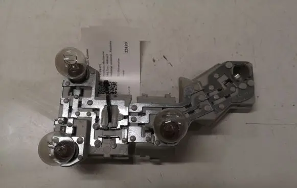 Volvo V50 Tail light bulb cover holder