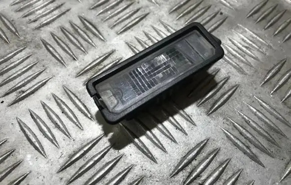 Volkswagen Golf V Number plate light 1k0943021