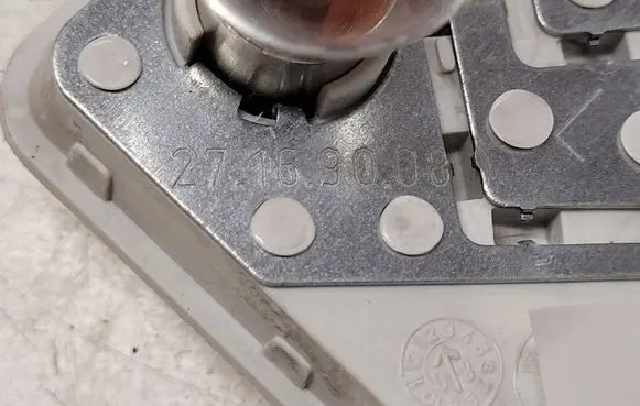 Volvo V50 Tail light bulb cover holder