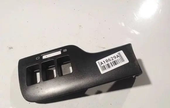 Subaru Legacy Front door window switch trim 