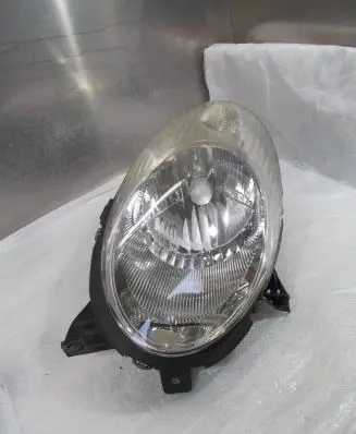 Nissan Micra Headlight/headlamp 26060BC500 89900074