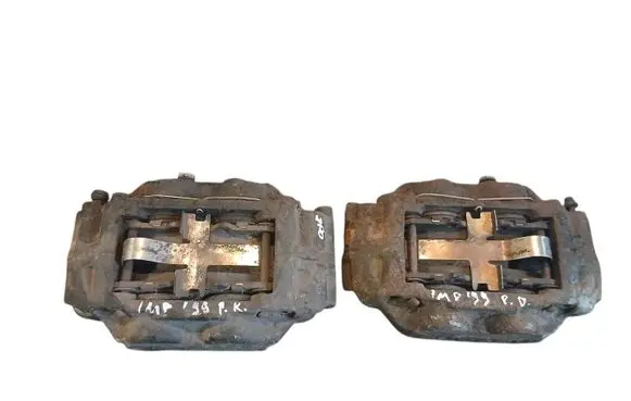 Subaru Impreza I Front brake caliper 