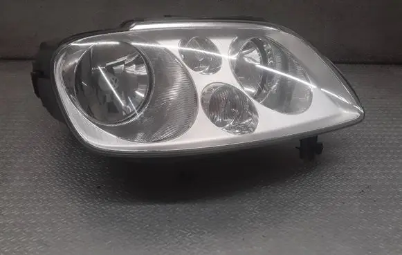 Volkswagen Touran I Headlight/headlamp 1T0941006M 0301205204