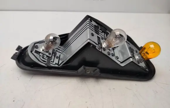 Renault Clio III Tail light bulb cover holder 