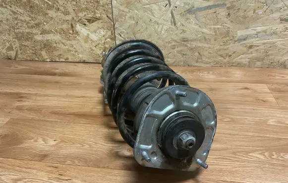 Front shock absorber with coil spring