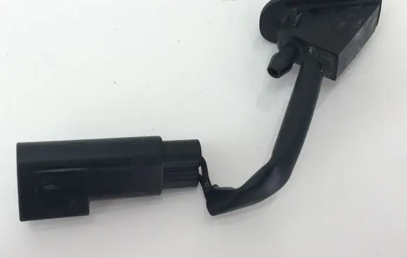 Windshield washer spray nozzle