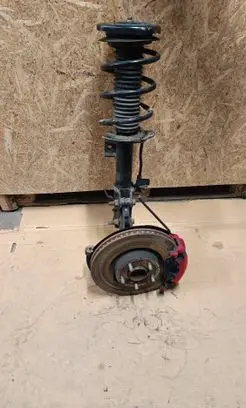Front wheel hub spindle knuckle