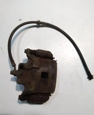 Nissan Juke I F15 Front brake caliper