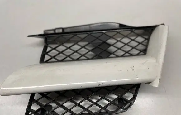 Mitsubishi Outlander Front bumper upper radiator grill MR971687