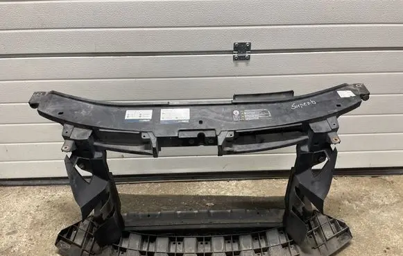Radiator support slam panel bracket