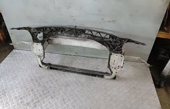 Radiator support slam panel