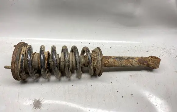 Mitsubishi Pajero Front shock absorber with coil spring