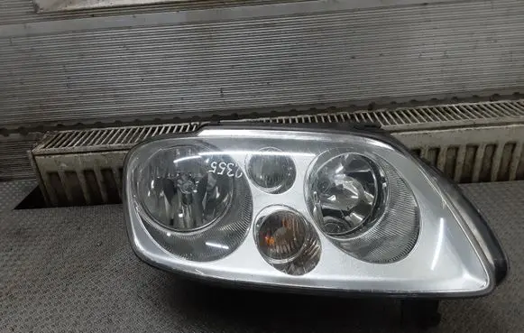 Volkswagen Touran I Headlight/headlamp 1T0941006F