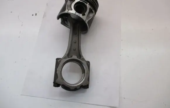 Opel Astra J Piston with connecting rod A17DTS