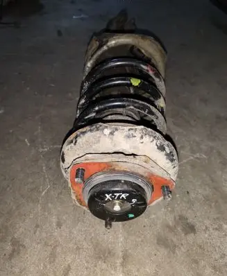 Nissan X-Trail T30 Rear shock absorber with coil spring 
