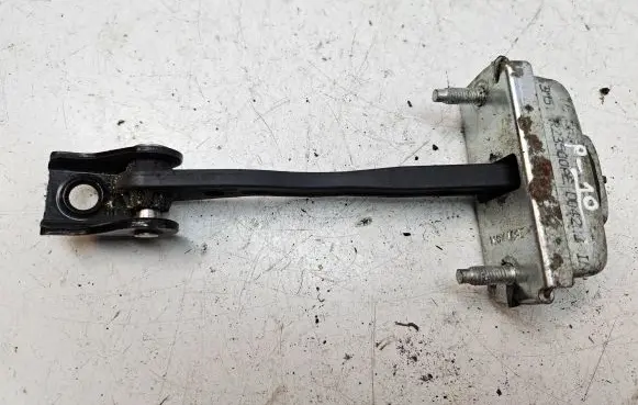 Front door check strap stopper