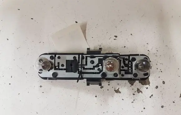 Nissan Almera N16 Tail light bulb cover holder 236873 236874