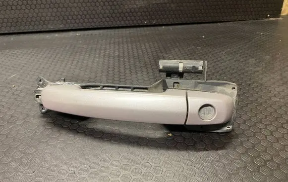 Suzuki Swift I Front door exterior handle