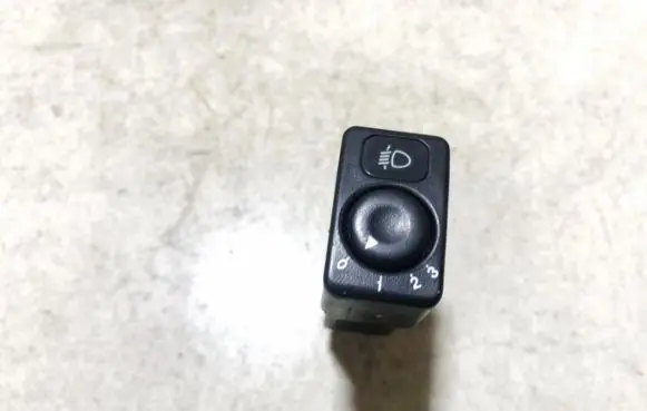 KIA Sportage Headlight level height control switch