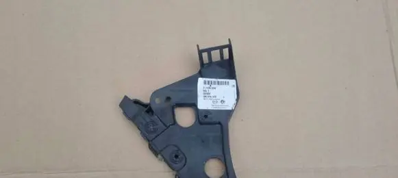 Opel Astra J Front bumper mounting bracket 13367890