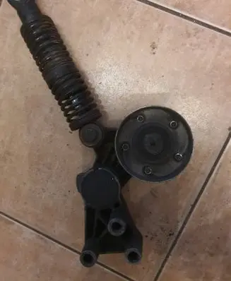 Generator/alternator belt tensioner