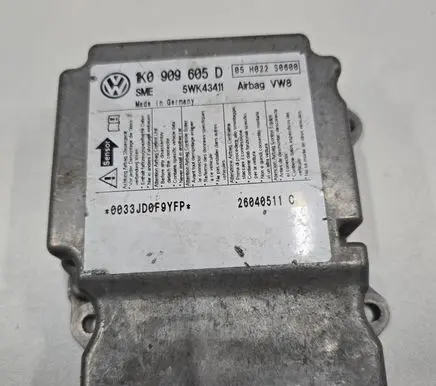 Volkswagen Golf V Airbag control unit/module 1K0909605D 05H022S0600 26040511C