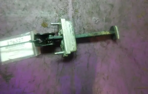Front door check strap stopper