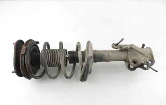 Toyota Corolla E110 Front shock absorber with coil spring 
