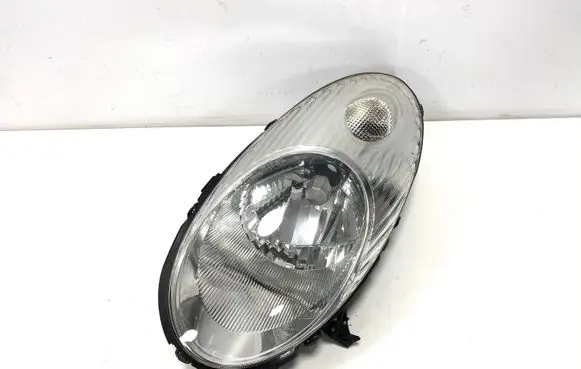 Nissan Micra Headlight/headlamp 26060BC500 89900074