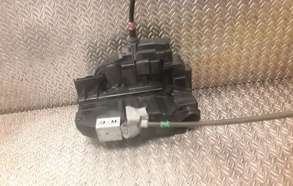 Nissan Juke I F15 Coupe door lock (next to the handle)