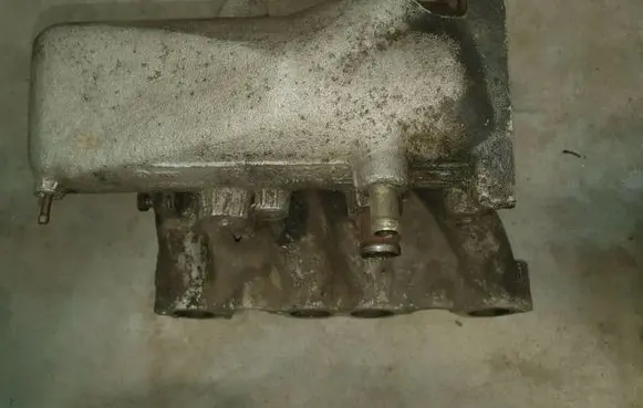 Volkswagen Golf II Intake manifold 037133223AD