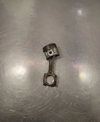 Piston with connecting rod