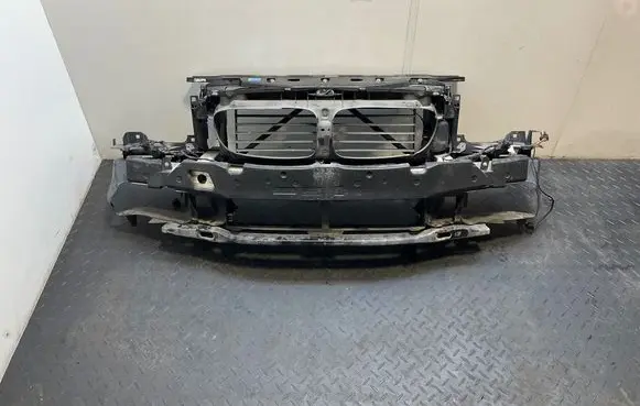 Radiator support slam panel