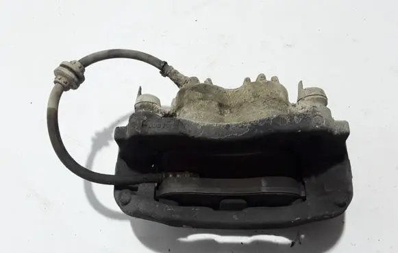 Opel Movano B Front brake caliper 410110092R