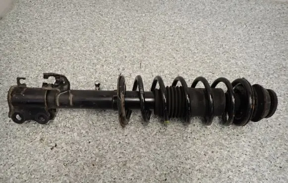 Nissan Micra Front shock absorber with coil spring