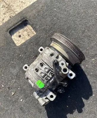 Nissan Almera Air conditioning (A/C) compressor (pump) 928002M202 D662342471