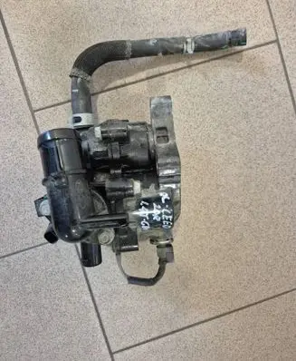 Thermostat/thermostat housing