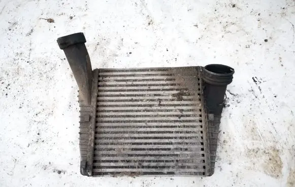 Volkswagen Touareg I Intercooler radiator 7l0145803a