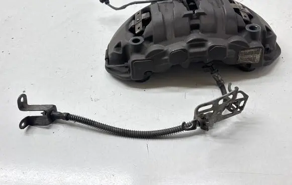 Porsche Panamera (970) Front brake caliper 97035105418 7PP615123