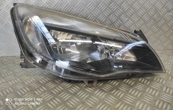 Opel Astra J Headlight/headlamp 13297721 LG01001110