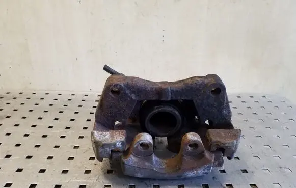 Volkswagen Touareg I Front brake caliper 7L6105D