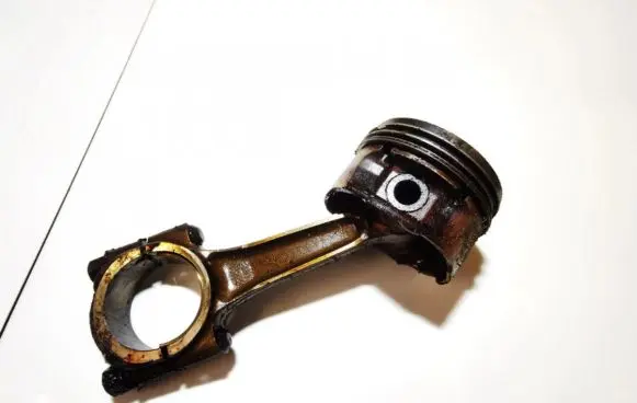 Piston with connecting rod