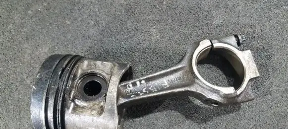 Piston with connecting rod